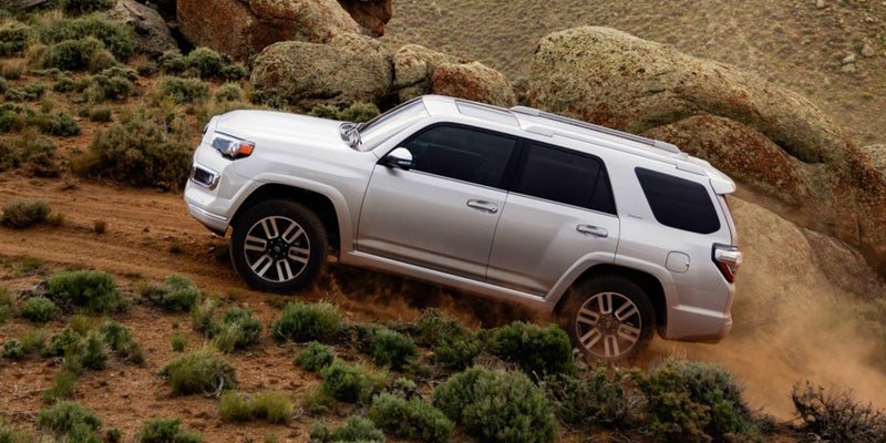 2024 Toyota 4Runner driving up a hill