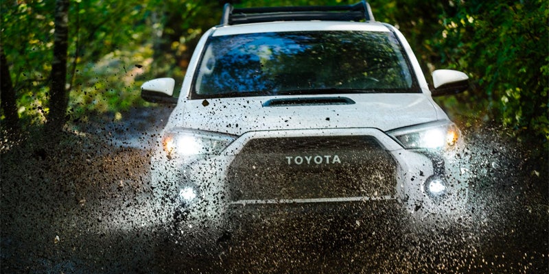 2024 Toyota 4Runner driving through mud
